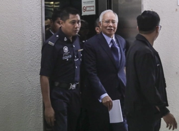 Former Malaysian prime minister appearing before court on corruption charges