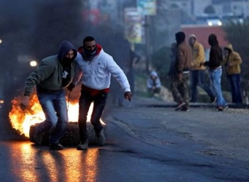 Wounded by the Israeli occupation forces in Aboud