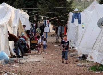 The European Union may reduce refugee aid in Turkey, and Greece cut asylum benefits