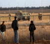 The occupation army announces the arrest of two citizens who crossed the separation fence from the central Gaza Strip