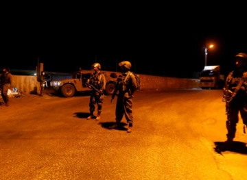 The occupation forces stormed the town of Azzun