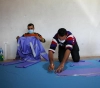 Gaza: Palestinian inspires China&acute;s experience by creating a protective uniform against Corona