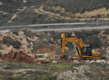 Dredging olive-planted areas in Azzun