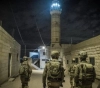 The occupation forces storm Ramallah and arrest two citizens