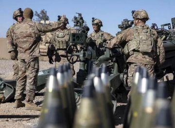 American forces hand over a military base to Iraqi forces