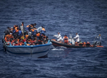 More than 200 Rohingya migrants were transported to Malaysia on a fishing boat