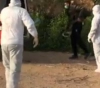 Settlers throw a Palestinian worker on the street