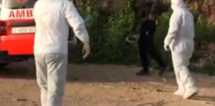 Settlers throw a Palestinian worker on the street