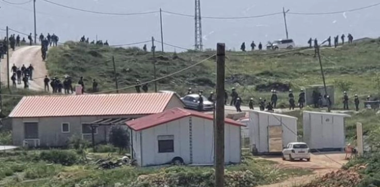 Settlers rebuild buildings in an outpost near Nablus