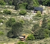 Sweeping wide lands in the Fukin Valley, claiming to search for antiquities