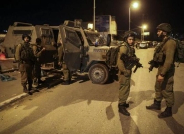 The occupation forces arrest three young men from Beta