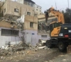 The occupation demolishes a house in Silwan, south of occupied Jerusalem