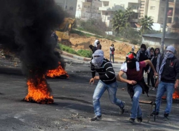 Clashes during the response to an attack by settlers in Asira al-Qibliya