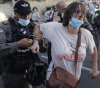 The occupation police suppress a march against the killing of Iyad al-Hallaq in Jerusalem