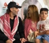 A rare wedding for a freed prisoner and his bride in the presence of their child