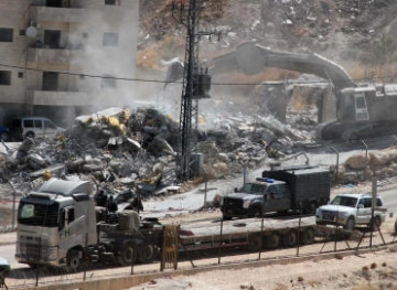 The occupation forces demolished a house in Al-Khader