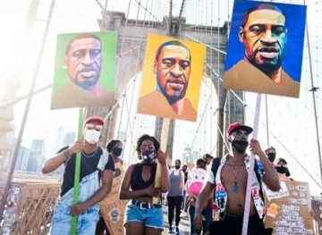 The United States commemorates the end of slavery in the midst of turmoil in its racist past