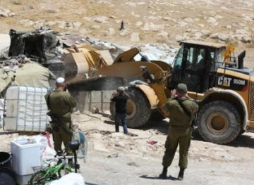 The occupation municipality starts demolishing two houses in the Ain al-Loza neighborhood in Silwan