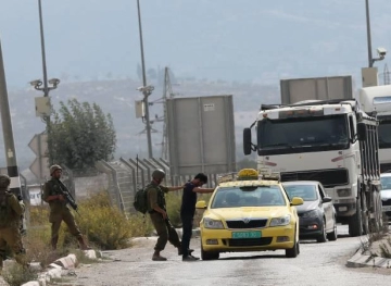 Settlers block Huwara Main Street