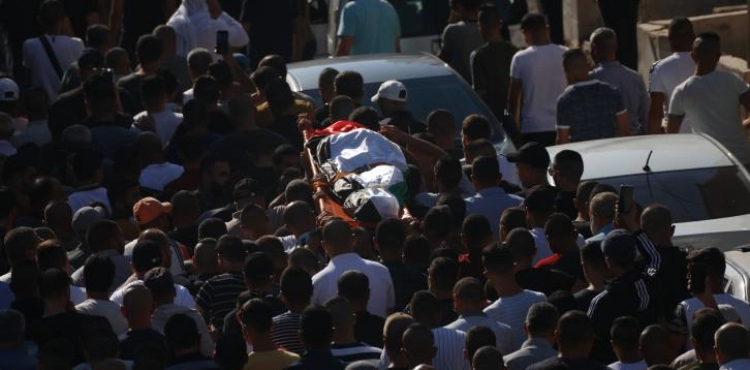 Large crowds The martyr Samoudiâ€™s funeral in Jenin