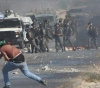 Four youths were injured by Israeli bullets and dozens of people suffocated during the Kafr Qaddum clashes