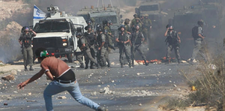 Four youths were injured by Israeli bullets and dozens of people suffocated during the Kafr Qaddum clashes
