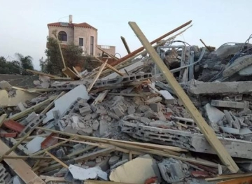 The occupation police demolish a house in the city of Lod