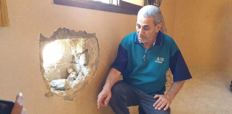 An Israeli missile hits a house in the southern Gaza Strip without exploding