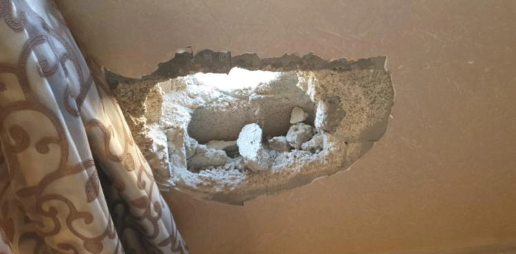 An Israeli missile hits a house in the southern Gaza Strip without exploding