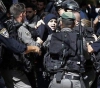 The occupation arrested a woman and a young man from Jerusalem after they were abused