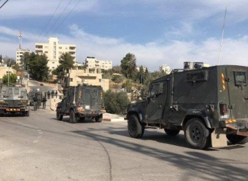 The occupation stormed the town of Birzeit, clashes erupted, and surveillance cameras were confiscated