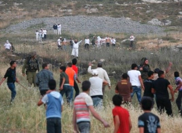 Casualties in clashes with the occupation forces in Asira al-Qibliya, and settlers attack the village