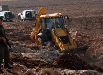 The bulldozers of the occupation uprooted olive trees and bulldozed operations west of Azzun
