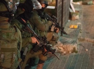 The occupation forces arrest two citizens and detain their children, west of Jenin