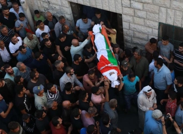 The funeral of the martyr Sanouber in the village of Yatma, south of Nablus
