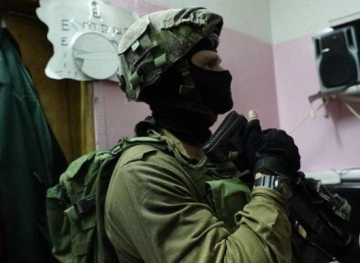 The arrest of two young men from the town of Azzun, east of Qalqilya