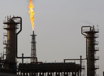 A fire in an oil refinery, north of Baghdad, after a missile fell