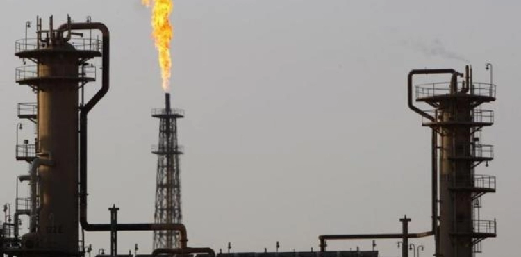 A fire in an oil refinery, north of Baghdad, after a missile fell