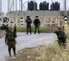 A worker was wounded by Israeli bullets near Barta&acute;a Gate