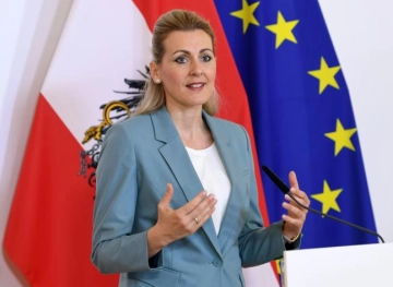An Austrian minister resigns after being accused of stealing university work