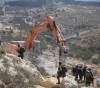 Injuries in clashes with the occupation forces while confronting the building of a settlement road in Kafr Naama