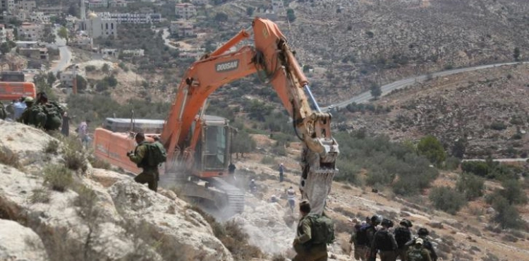 Injuries in clashes with the occupation forces while confronting the building of a settlement road in Kafr Naama