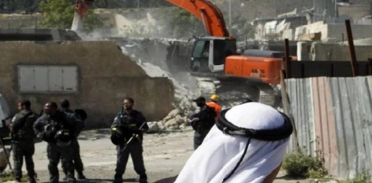 The occupation forces a citizen to demolish a livestock pens east of Bethlehem