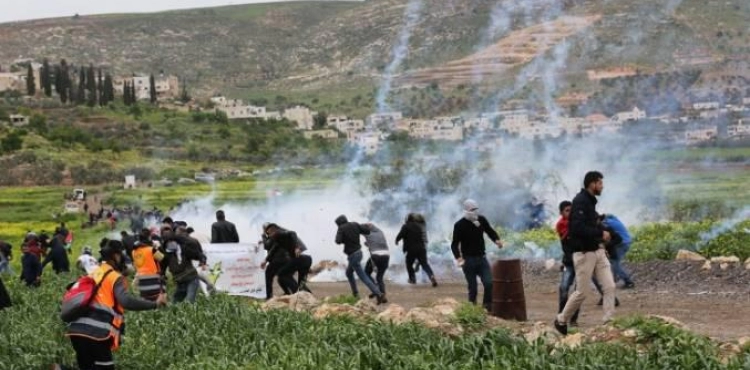 The occupation strikes a number of citizens during marches in separate areas of the West Bank