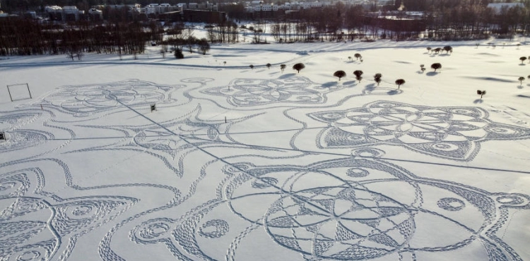 A giant painting carved into the snow is a huge success in Finland