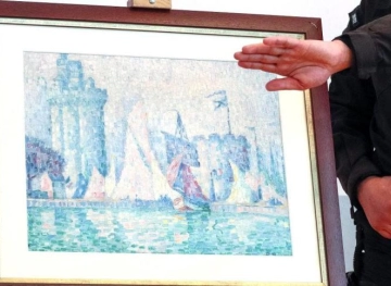 A painting returned to a French museum after it was stolen and smuggled into Ukraine