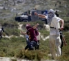 Settlers attack homes and shepherds in Asira al-Qibliya