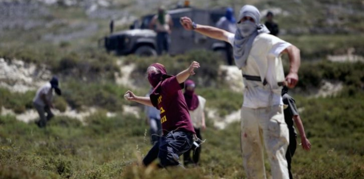 Settlers attack homes and shepherds in Asira al-Qibliya