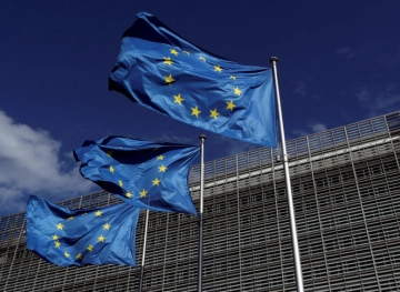 EU agrees to impose sanctions on four Russian officials