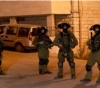 The occupation raids the homes of a martyr&acute;s family from Silwan and arrests two young relatives